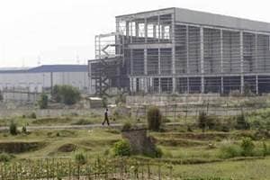 singur land, tata, tata singur, tata nano, nano singur, mamata banerjee singur, supreme court singur, land acquisituion act