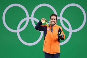 Tanasan, daughter of an international boxer, became Thailand's fourth gold medallist in women's weightlifting with a total of 200kg. (Reuters)