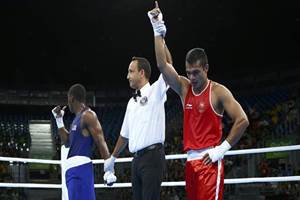 Vikas stood a win away from an elusive Olympic medal as he outclassed Turkey's Sipal Onder 3-0 to make the quarterfinals of men's 75kg middleweight boxing. (Source: Reuters)