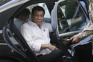 Duterte said during a two-day visit to meet Vietnam's leaders that he wants to establish new trade and commercial alliances with China and Russia, and that the war games were something Beijing does not want. (AP)