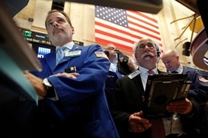 Wall Street ended little changed on Tuesday as healthcare gains countered declines in energy shares, a day before highly anticipated outcomes of monetary policy meetings in the United States and Japan.(Reuters)