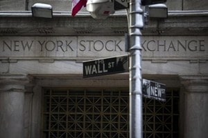 The Wall St. sign is seen outside the door to the New York Stock Exchange in New York's financial district. (Reuters) The Wall St. sign is seen outside the door to the New York Stock Exchange in New York's financial district. (Reuters)