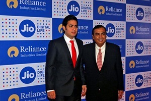 Mukesh Ambani (R), chairman of Reliance Industries Ltd, poses with his son Akash before addressing the company's annual general meeting in Mumbai, India September 1, 2016. (REUTERS) Mukesh Ambani (R), chairman of Reliance Industries Ltd, poses with his son Akash before addressing the company's annual general meeting in Mumbai, India September 1, 2016. (REUTERS)