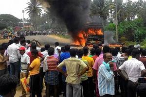 A massive violence broke out yesterday in parts of the city as several trucks, school buses and bus stands were seen being set on fire by the pro-Kannada protestors in West Bengaluru. (PTI)
