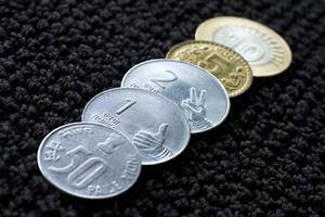 After a WhatsApp message saying that the coin declared invalid by RBI and was subsequently banned, many shopkeepers and kiosk owners refused to take Rs 10 coins. (Reuters) After a WhatsApp message saying that the coin declared invalid by RBI and was subsequently banned, many shopkeepers and kiosk owners refused to take Rs 10 coins. (Reuters)