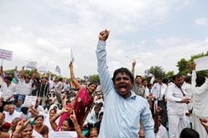 Various Dalit organisations fighting against "atrocities" on the community in Gujarat had announced "rail roko", under the banner of Rashtriya Dalit Adhikar Manch, at some places in the state today.(Representational Image: Reuters) Various Dalit organisations fighting against "atrocities" on the community in Gujarat had announced "rail roko", under the banner of Rashtriya Dalit Adhikar Manch, at some places in the state today.(Representational Image: Reuters)