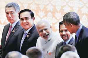 Prime Minister Narendra Modi and US President Barack Obama greet each other in Vientiane, Laos, during the ASEAN summit