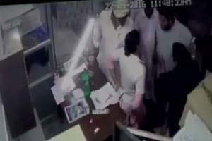 Captured by the CCTV cameras installed in the premises, the video shows Paramjeet pushing the nurse brutally and when somebody intervenes, instead of stopping, his son slaps her further. (ANI)