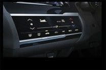 Feather touch panel for the climate control is unique in the segment. 