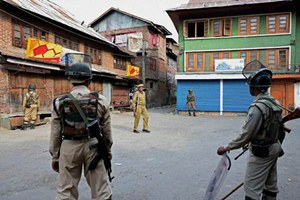 Security forces kept on pounding the hostel of the Entrepreneurship Development Institute (EDI) where guerrillas armed with rockets, grenades and automatic gunfire have been holding the security forces at bay for over 24 hours now. (PTI)