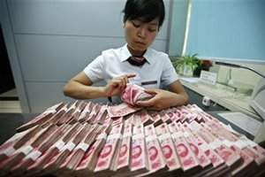 The yuan fell on Friday to an eight-year low of 6.8950 per dollar, extending a sharp decline in the past week and taking its fall so far this year to 5.8 percent. (Reuters)