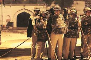 Around 200 police personnel have been deployed at the spot to maintain the law and order situation. (Express Photo by Amit Mehra)