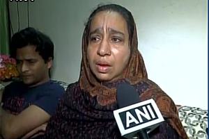 Ahmed's mother said, " We only went there (at India Gate) to sit but police dragged us and manhandled us while removing us." (ANI) Ahmed's mother said, " We only went there (at India Gate) to sit but police dragged us and manhandled us while removing us." (ANI)