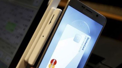 The companies offering M-wallet services mainly target young tech-savvy people. (Reuters)
