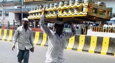 "We are following PM Modi's path of digital India and will save time and money. We'll register people by verifying Aadhaar card and PAN card," said Ravindra, a dabbawala. (Source: PTI)