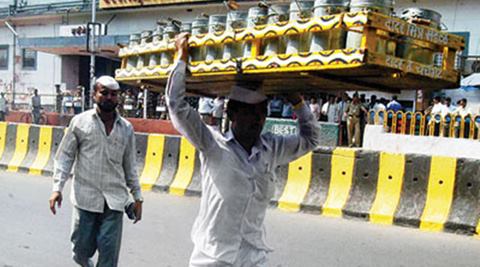 "We are following PM Modi's path of digital India and will save time and money. We'll register people by verifying Aadhaar card and PAN card," said Ravindra, a dabbawala. (Source: PTI)