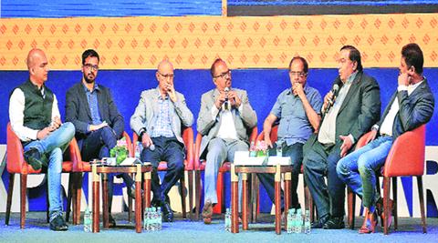  (From left) Xiaomi India head Manu Jain, Ola co-founder Ankit Bhati, Happiest Minds founder Ashok Soota, The Financial Express executive editor -south Darlington Jose Hector, iSPIRT founder Sharad Sharma, Nasscom Software Product Council chairman Ravi Gururaj and Freshdesk founder Girish Mathrubootham