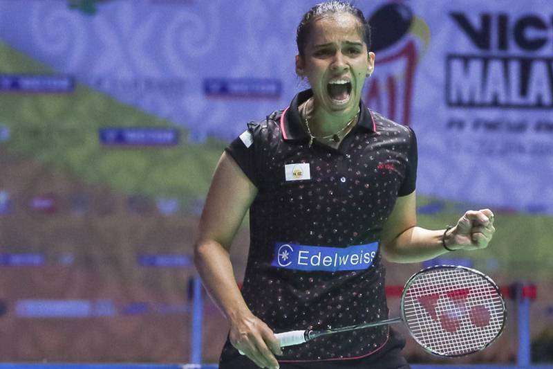 Saina Nehwal celebrates after defeating Thailand 's Pornpawee Chochuwong during Malaysia Masters badminton tournament women's singles final in Sibu, Sarawak, Malaysia. (AP)