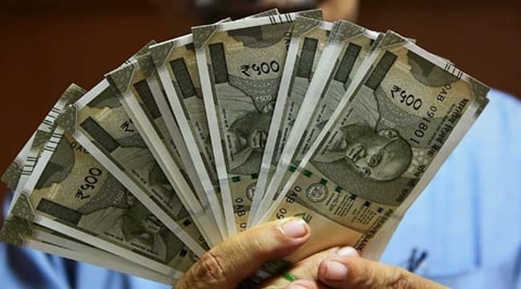 The central bank will remove the limits on cash withdrawals in two stages.