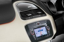 2 DIN touchscreen infotainment system offers reasonable quality along with navigation, Bluetooth connectivity and USB, AUX and Radio playback options 