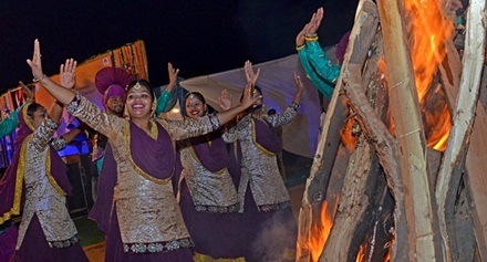 Girls in traditional outfits perform during Lohri celebration on the theme of say no to violence against women and girl child organised by Municipal Corporation, in Sector 40 of Chandigarh on Monday, January 13 2014. (Express photo by Kshitij Mohan) Girls in traditional outfits perform during Lohri celebration on the theme of say no to violence against women and girl child organised by Municipal Corporation, in Sector 40 of Chandigarh on Monday, January 13 2014. (Express photo by Kshitij Mohan)