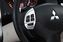  The steering mounted controls ease the operation of audio and telephony while driving the Mitsubishi Pajero Sport 