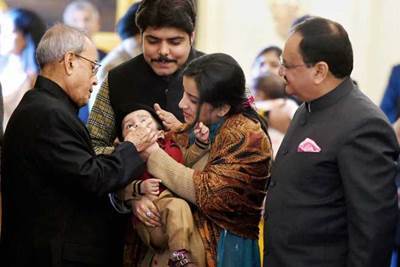 President Pranab Mukherjee today launched the pulse polio programme for 2017 by administering polio drops to children aged below five years at the Rashtrapati Bhavan here. (PTI) President Pranab Mukherjee today launched the pulse polio programme for 2017 by administering polio drops to children aged below five years at the Rashtrapati Bhavan here. (PTI)