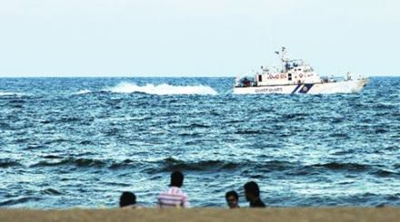 A ship sails past Chennai. The author says the rapid rise of India and China represents an age of excitement and opportunity
