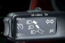  Cruise control available on the Volkswagen Beetle adds to the driver's comfort over long hauls. 