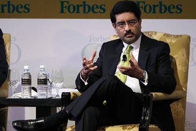Birla has chosen to team up with Vodafone despite the costs – the merged entity must return scarce spectrum in five circles thanks to Trai-spectrum-caps and will have to fork out Rs 2,000-Rs 3,000 crore by way of spectrum liberalisation charges – and must have good reason to do so.(Reuters)  Birla has chosen to team up with Vodafone despite the costs – the merged entity must return scarce spectrum in five circles thanks to Trai-spectrum-caps and will have to fork out Rs 2,000-Rs 3,000 crore by way of spectrum liberalisation charges – and must have good reason to do so.(Reuters)