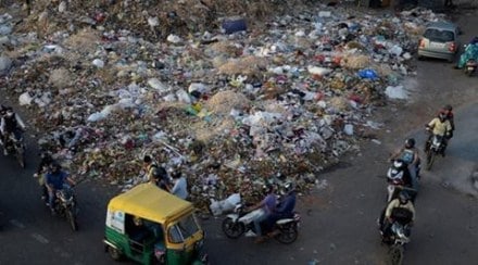 MCD sanitation workers dump muck on streets, go on strike