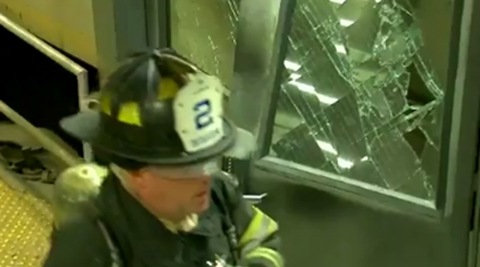 Passengers told TV news crews on the scene that there was a loud bang and a jolt that sent some people flying. Some people were carried away on stretchers. Others were sitting outside the train holding ice packs to their heads. (Video grab) Passengers told TV news crews on the scene that there was a loud bang and a jolt that sent some people flying. Some people were carried away on stretchers. Others were sitting outside the train holding ice packs to their heads. (Video grab)