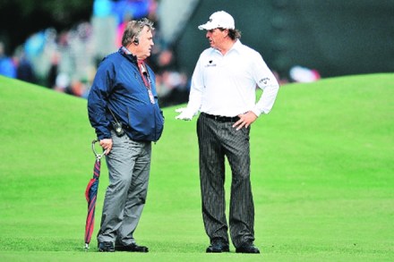 Phil Mickelson having a long-drawn discussion with a rules official at last year’s British Open. Even pros need help in interpreting and applying the ‘Rules of Golf’