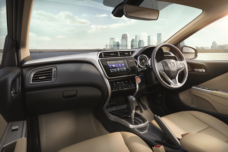 The cabin of the new Honda City gets a host of new convenience features. The major change that has been made to the 2017 City includes a 17.7 cm or a 7-inch DIGIPAD infotainment system with navigation, MirrorLink, USB, Bluetooth and an in-built memory of 1.5 GB. This new system has been developed by the company's Indian R&D facility and features internet connectivity. The lower versions are equipped with an LCD-display audio system with four speakers and connectivity options like Aux-In, AM/FM, MP3, Bluetooth, i-Pod, HDMI port and SD memory card slots.