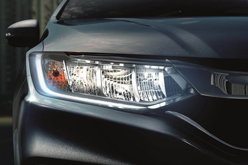 The company has equipped the City sedan with LED projector headlamps with standard LED Daytime Running Lights (DRL) across the variants. The sedan also features LED tail lamps, lip-mounted spoiler and 16-inch diamond cut alloy wheels on the top trim. The base versions get 15-inch wheels with a full wheel cover.