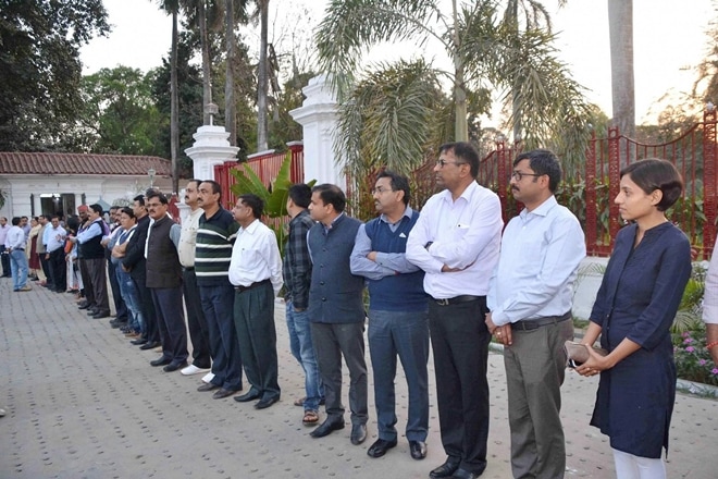 IAS officers stage a silent protest outside the Bihar Governor's House against the arrest of BSSC Chairman and their senior colleague Sudhir Kumar in the multi-crore job scam, in Patna on Sunday. (PTI) IAS officers stage a silent protest outside the Bihar Governor's House against the arrest of BSSC Chairman and their senior colleague Sudhir Kumar in the multi-crore job scam, in Patna on Sunday. (PTI)