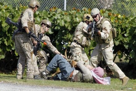 In an act straight out of top Hollywood war flicks, US Navy's "Sea, Air, and Land" Teams popularly known as the Navy SEALs, have conducted a deadly pre-dawn raid on the al-Qaeda militant group in Yemen. (Representative image by Reuters) In an act straight out of top Hollywood war flicks, US Navy's "Sea, Air, and Land" Teams popularly known as the Navy SEALs, have conducted a deadly pre-dawn raid on the al-Qaeda militant group in Yemen. (Representative image by Reuters)