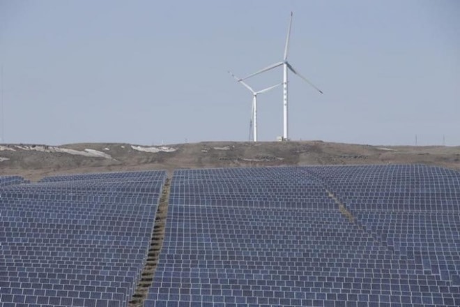 Wind power tariff dropped to a record low of Rs 3.46 per unit today in an auction of 1,000 MW capacity conducted by Solar Energy Corporation of India (SECI). (Reuters image) Wind power tariff dropped to a record low of Rs 3.46 per unit today in an auction of 1,000 MW capacity conducted by Solar Energy Corporation of India (SECI). (Reuters image)