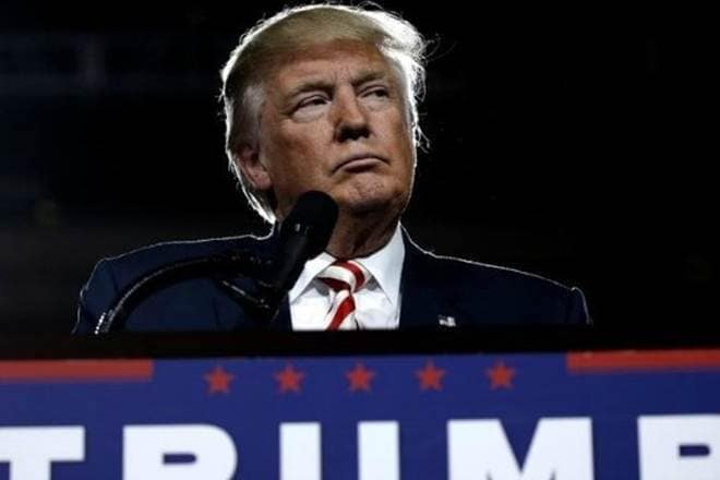 U.S. President Donald Trump and Japanese Prime Minister Shinzo Abe's weekend outing in Florida could be viewed as more than a leisurely bonding exercise between two world leaders. (File Photo)