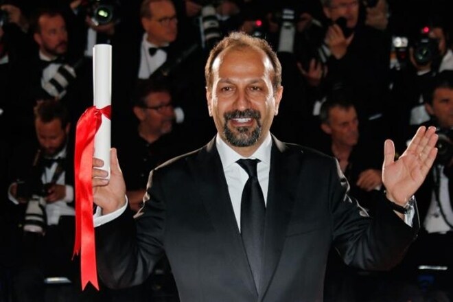 Oscar-nominated Iranian film director Asghar Farhadi has sent a video message to a rally attended by celebrities and top talent agents. (Reuters)