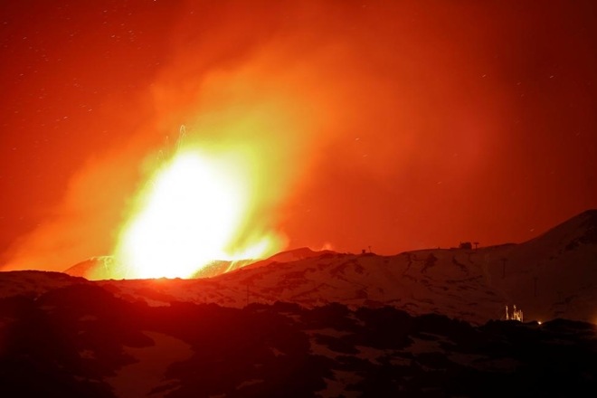 Bright lava lit up the night sky on the Italian island of Sicily on Monday as Mount Etna erupted for the first time this year. (Reuters)