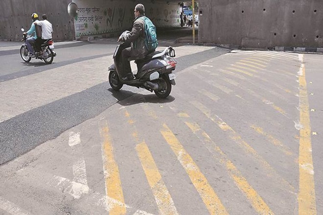 Speed breakers, the purpose of which is to force riders to apply brakes on rushing motor vehicles, have apparently become reasons for loss of lives on roads across India. (Express Photo) Speed breakers, the purpose of which is to force riders to apply brakes on rushing motor vehicles, have apparently become reasons for loss of lives on roads across India. (Express Photo)