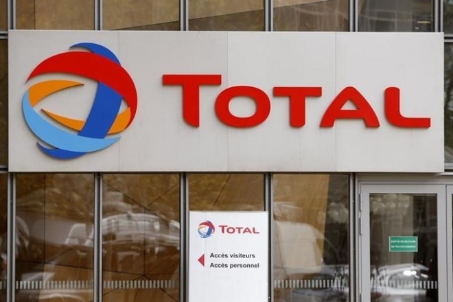 Total on hunt for acquisitions as cost cuts lift profit Total on hunt for acquisitions as cost cuts lift profit