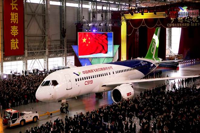 A single-aisle passenger jet that is being built by the Commercial Aircraft Corp. of China is set for its first test flight by the end of next month, according to Philippe Petitcolin, chief executive officer of Safran SA, an aircraft engine maker.