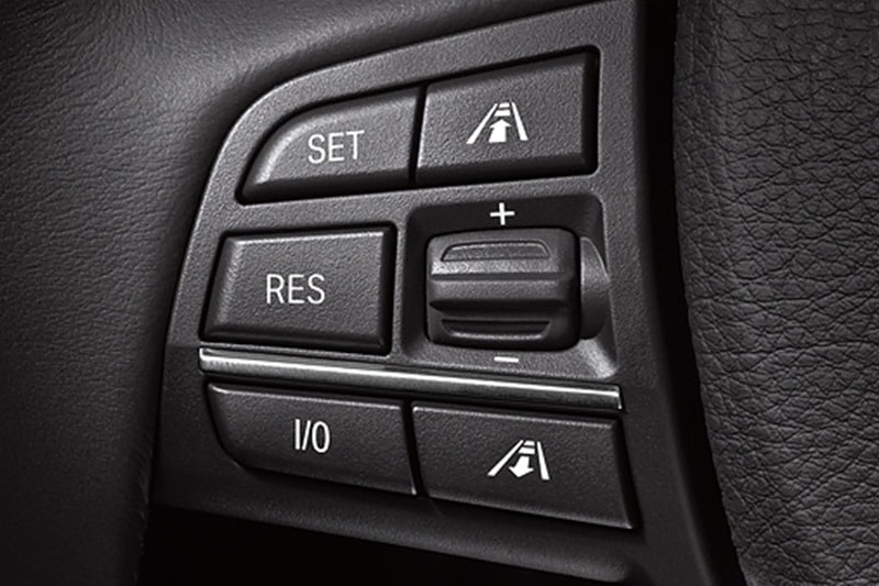 Cruise Control: A cruise control is a feature in a car that maintains the speed of the vehicle without any intervention of a driver. This allows the engine to maintain a constant speed on highways. The driver can increase or decrease the speed of the vehicle with the help of switches and set the cruise button. However, this system deactivates as soon as the brake is applied. The cruise control engages the throttle valve by a cable connected to an actuator. The throttle valve controls the power and speed of the engine by limiting how much air/fuel mixture it takes in.