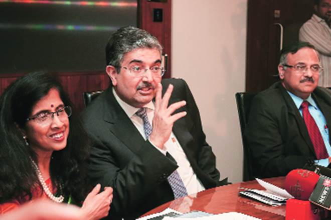 (From left) Kotak Mahindra Bank president — consumer banking Shanti Ekambaram, MD Uday Kotak and president & COO Mohan N Shenoi at a press conference in Mumbai on Wednesday. (Dilip Kagda)