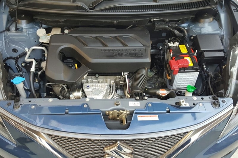 Unlike Maruti Suzuki's methodology of launching fuel-efficient inclined cars, the Baleno RS has a powerful three-cylinder turbocharged petrol engine. This engine generates 100 hp of power at 5,500 rpm and 150 Nm of torque from 1,700 rpm to 4,500 rpm. Although it is the least powerful in its segment in which the Volkswagen GT TSI and the Fiat Abarth Punto pose as direct competitors, it has a better power-to-weight ratio. The RS has 104 hp per tonne power-to-weight ratio compared to the Volkswagen's 93 hp per tonne, thanks to the Baleno's light 960 kg weight compared to the Polo GT TSI's 1,105 kg. In addition to the impressive performance, the Boosterjet Engine still has a claimed fuel efficiency of 21.1 kmpl