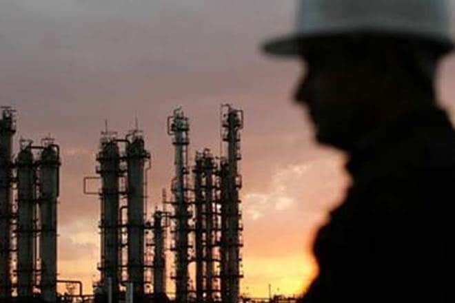 Oil futures supported by weaker dollar, but bloated supply still weighs