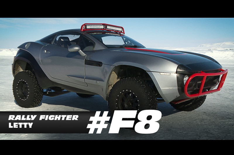 Loud engine notes and deafening gun shots, the ever successful franschise Fast and Furious is back with its eighth edition, which will release on 14th April. Besides Letty (Michelle Rodriguez), Dom (Vin Diesel) will now also be accompanied by the leading ladies of Hollywood, Helen Mirren and Charlize Theron. But what we're interested in, at least for now, is the cars. First up, featured here is what Letty is driving on frozen grounds of Iceland. Perhaps the coolest one of the lot in a very Hollywood kind of way. Meet the Rally Fighter, which is the brainchild of a company called Local Motors. The brand takes pride in building powerful custom cars as per the requirement of the customer down to th very last bolt.