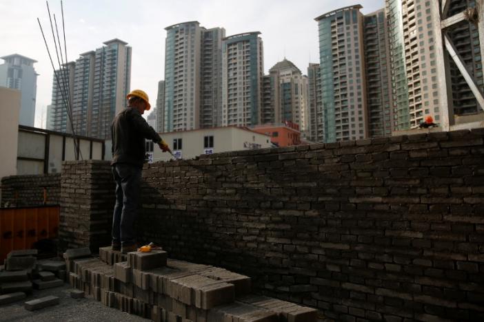 A worker works at a construction site in Shanghai, China. (Reuters)
